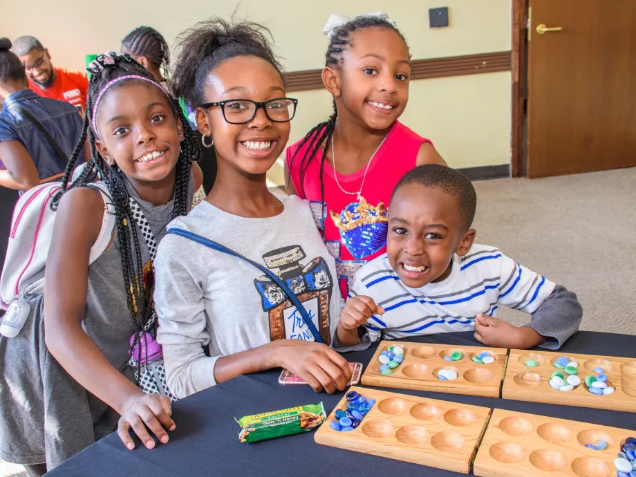 Kids playing Mancala